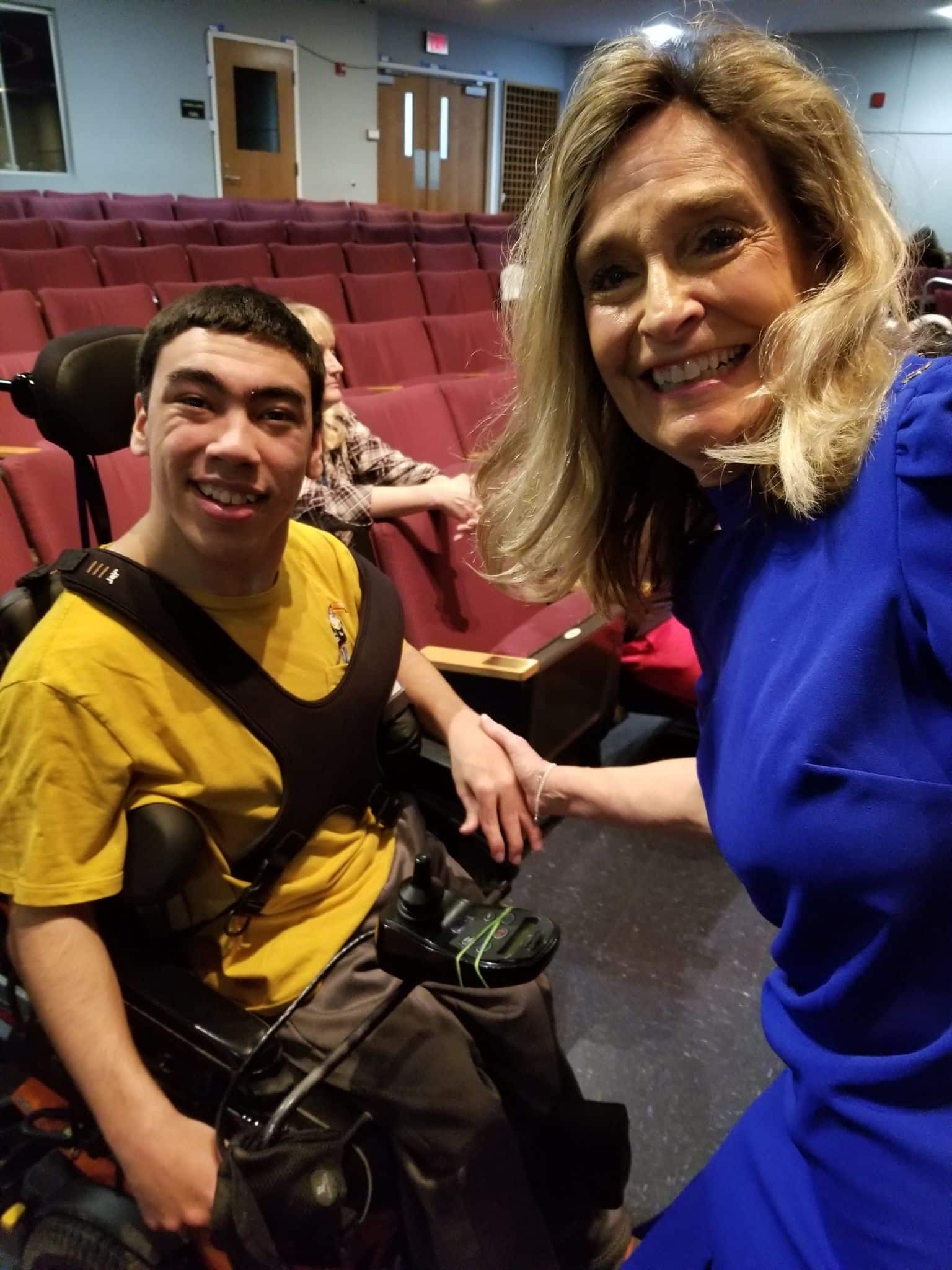 Marcella with a student using a wheelchair